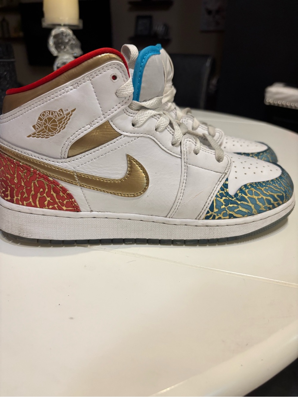 Jordan Mid-Top Sneakers in White with Gold, Teal & Red Accents